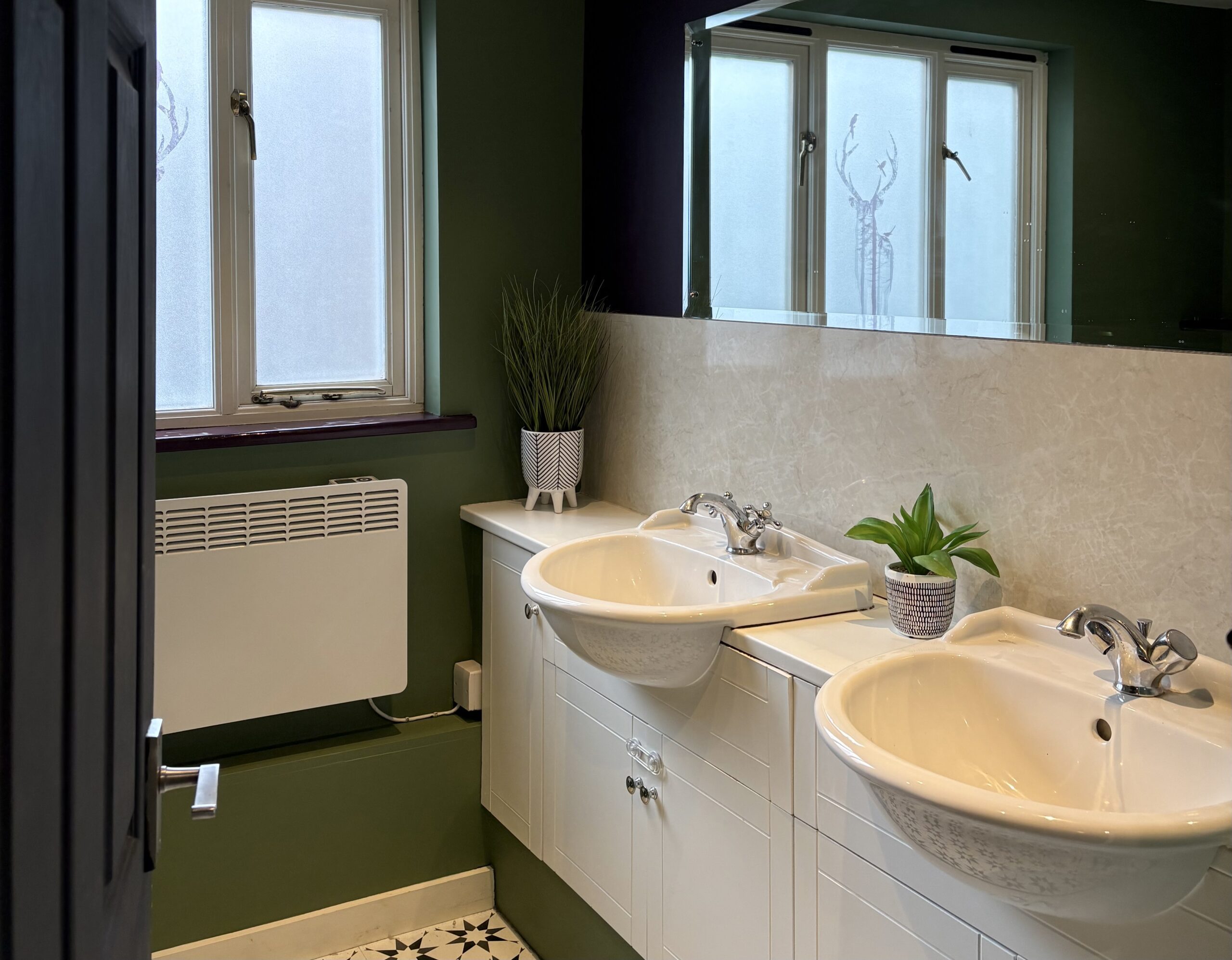 Bathroom Decorated in Farrow & Ball Chalke Green, shelves & windowsills decorated in Pelt and door decorated in Stiffkey Blue